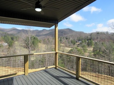 Modern sophistication meets mountain serenity on this newly on Mill Creek Country Club in North Carolina - for sale on GolfHomes.com, golf home, golf lot