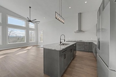 Modern sophistication meets mountain serenity on this newly on Mill Creek Country Club in North Carolina - for sale on GolfHomes.com, golf home, golf lot