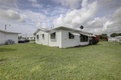 Lovely 2/1 single family home in verified 55+ community of on Leisureville Community Association in Florida - for sale on GolfHomes.com, golf home, golf lot