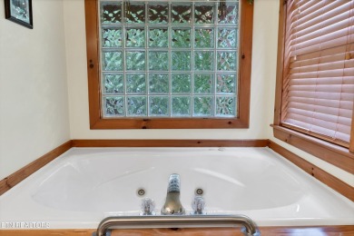 Super cool one bedroom, two bath, with double sided sleeping on Laurel Valley Golf Course in Tennessee - for sale on GolfHomes.com, golf home, golf lot