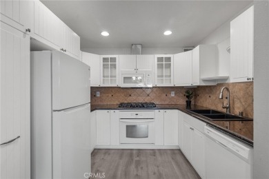 Welcome to this beautifully updated end-unit Townhome, featuring on Vista Valencia Golf Course in California - for sale on GolfHomes.com, golf home, golf lot