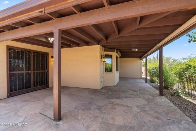 This remodeled, Oro Valley, 4 bedroom, 2 bath, home located in on El Conquistador Country Club - Conquistador in Arizona - for sale on GolfHomes.com, golf home, golf lot