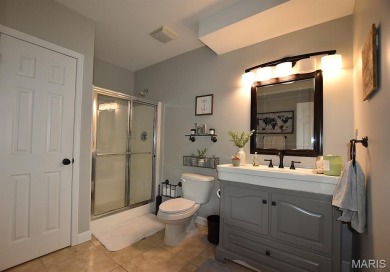 Serenity at its finest ... imagine living in a tree lined on Country Club of Sugar Creek in Missouri - for sale on GolfHomes.com, golf home, golf lot
