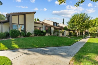 Welcome to this beautifully updated end-unit Townhome, featuring on Vista Valencia Golf Course in California - for sale on GolfHomes.com, golf home, golf lot