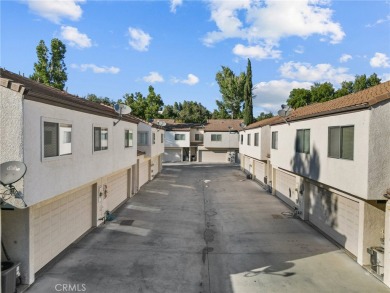 Welcome to this beautifully updated end-unit Townhome, featuring on Vista Valencia Golf Course in California - for sale on GolfHomes.com, golf home, golf lot