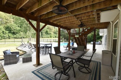 Serenity at its finest ... imagine living in a tree lined on Country Club of Sugar Creek in Missouri - for sale on GolfHomes.com, golf home, golf lot