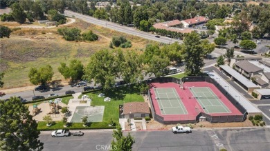 Welcome to this beautifully updated end-unit Townhome, featuring on Vista Valencia Golf Course in California - for sale on GolfHomes.com, golf home, golf lot