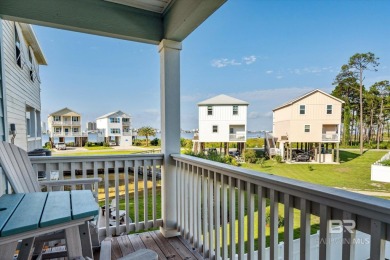 Welcome to this stunning waterfront home, a true hidden gem on The Golf Club of the Wharf in Alabama - for sale on GolfHomes.com, golf home, golf lot