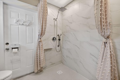 Extremely well-maintained villa with 2 car garage overlooking on The Golf Club of Jupiter in Florida - for sale on GolfHomes.com, golf home, golf lot