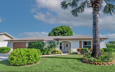 This pristine 2BR/2BA home is situated on a quiet cul-se-sac and on Riviera Golf Club in Florida - for sale on GolfHomes.com, golf home, golf lot