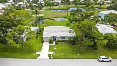 This charming home is perfectly situated on an oversized golf on Riverbend Golf Club in Florida - for sale on GolfHomes.com, golf home, golf lot