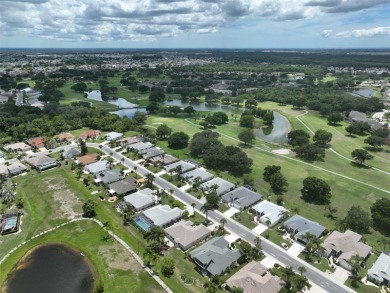 This spacious 2 bedroom 2 bath Kingston split floor plan on Caloosa Greens Executive Golf Course in Florida - for sale on GolfHomes.com, golf home, golf lot