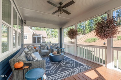 Rocking chair front porch welcomes you to this beautifully on The Club At Twelve Oaks in North Carolina - for sale on GolfHomes.com, golf home, golf lot