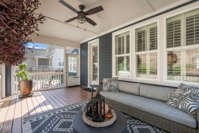 Rocking chair front porch welcomes you to this beautifully on The Club At Twelve Oaks in North Carolina - for sale on GolfHomes.com, golf home, golf lot