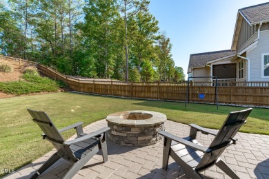 Rocking chair front porch welcomes you to this beautifully on The Club At Twelve Oaks in North Carolina - for sale on GolfHomes.com, golf home, golf lot