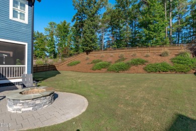 Rocking chair front porch welcomes you to this beautifully on The Club At Twelve Oaks in North Carolina - for sale on GolfHomes.com, golf home, golf lot