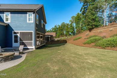 Rocking chair front porch welcomes you to this beautifully on The Club At Twelve Oaks in North Carolina - for sale on GolfHomes.com, golf home, golf lot