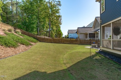 Rocking chair front porch welcomes you to this beautifully on The Club At Twelve Oaks in North Carolina - for sale on GolfHomes.com, golf home, golf lot