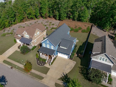 Rocking chair front porch welcomes you to this beautifully on The Club At Twelve Oaks in North Carolina - for sale on GolfHomes.com, golf home, golf lot