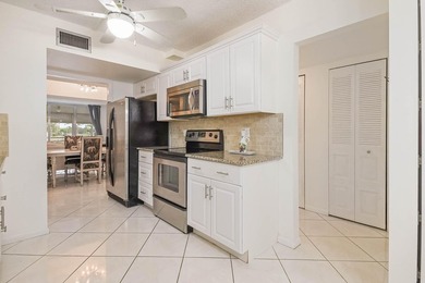 WELCOME TO THIS NATURALLY BRIGHT CONDO WITH SOUTH FACING BALCONY on Poinciana Golf Club in Florida - for sale on GolfHomes.com, golf home, golf lot