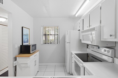 Beautifully maintained 2-bedroom, 2-bath corner unit in on Forest Oaks Golf Club in Florida - for sale on GolfHomes.com, golf home, golf lot