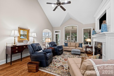 Anchoring a prominent corner lot in Woodbridge North, this on Woodbridge Golf Links in North Carolina - for sale on GolfHomes.com, golf home, golf lot