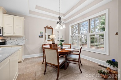 Anchoring a prominent corner lot in Woodbridge North, this on Woodbridge Golf Links in North Carolina - for sale on GolfHomes.com, golf home, golf lot