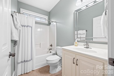 Anchoring a prominent corner lot in Woodbridge North, this on Woodbridge Golf Links in North Carolina - for sale on GolfHomes.com, golf home, golf lot