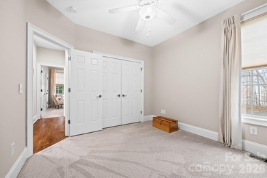 Anchoring a prominent corner lot in Woodbridge North, this on Woodbridge Golf Links in North Carolina - for sale on GolfHomes.com, golf home, golf lot