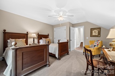 Anchoring a prominent corner lot in Woodbridge North, this on Woodbridge Golf Links in North Carolina - for sale on GolfHomes.com, golf home, golf lot