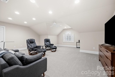 Anchoring a prominent corner lot in Woodbridge North, this on Woodbridge Golf Links in North Carolina - for sale on GolfHomes.com, golf home, golf lot