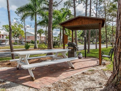 This 1st floor end unit condo is one the largest floorplans in on Plantation Golf and Country Club in Florida - for sale on GolfHomes.com, golf home, golf lot