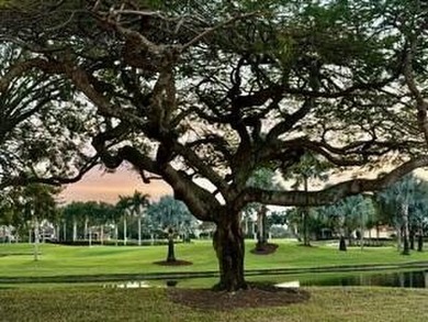 Spectacular golf and water views of this 12th ''island green'' on  in Florida - for sale on GolfHomes.com, golf home, golf lot