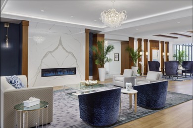 Spectacular golf and water views of this 12th ''island green'' on  in Florida - for sale on GolfHomes.com, golf home, golf lot