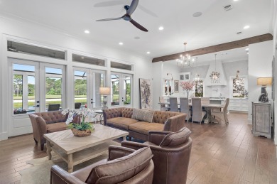 Discover the perfect fusion of modern elegance and artistic on Regatta Bay Golf and Country Club in Florida - for sale on GolfHomes.com, golf home, golf lot