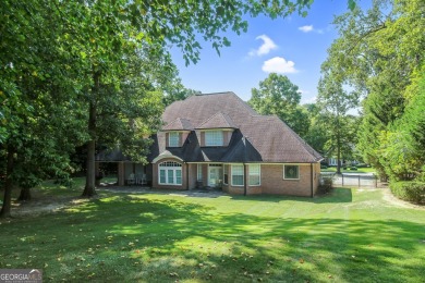 Exquisite Custom Residence in Lake Spivey Country Club on Lake Spivey Golf Club in Georgia - for sale on GolfHomes.com, golf home, golf lot