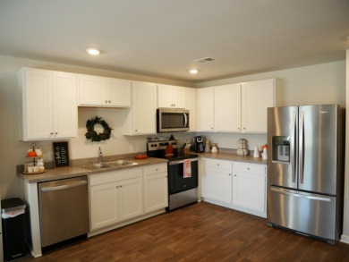 Come Fall in love with this beautiful move-in-ready 2023-built on Santee National Golf Course in South Carolina - for sale on GolfHomes.com, golf home, golf lot