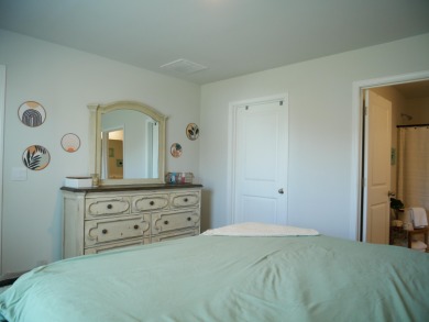Come Fall in love with this beautiful move-in-ready 2023-built on Santee National Golf Course in South Carolina - for sale on GolfHomes.com, golf home, golf lot