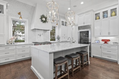 Discover the perfect fusion of modern elegance and artistic on Regatta Bay Golf and Country Club in Florida - for sale on GolfHomes.com, golf home, golf lot