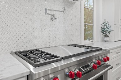 Discover the perfect fusion of modern elegance and artistic on Regatta Bay Golf and Country Club in Florida - for sale on GolfHomes.com, golf home, golf lot