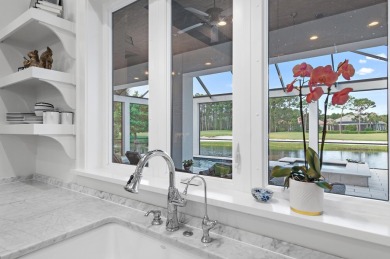 Discover the perfect fusion of modern elegance and artistic on Regatta Bay Golf and Country Club in Florida - for sale on GolfHomes.com, golf home, golf lot