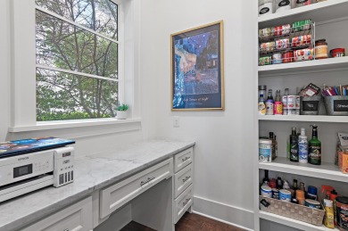 Discover the perfect fusion of modern elegance and artistic on Regatta Bay Golf and Country Club in Florida - for sale on GolfHomes.com, golf home, golf lot