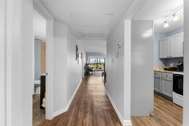 Stunning 2-Bed, 2-Bath Condo Overlooking Feather Sound Golf on Feather Sound Country Club in Florida - for sale on GolfHomes.com, golf home, golf lot