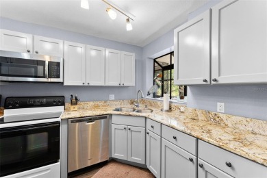 Stunning 2-Bed, 2-Bath Condo Overlooking Feather Sound Golf on Feather Sound Country Club in Florida - for sale on GolfHomes.com, golf home, golf lot