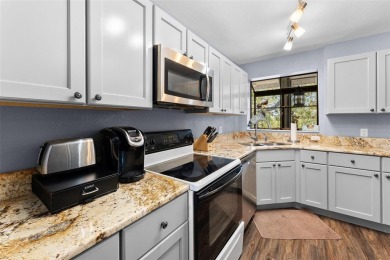 Stunning 2-Bed, 2-Bath Condo Overlooking Feather Sound Golf on Feather Sound Country Club in Florida - for sale on GolfHomes.com, golf home, golf lot