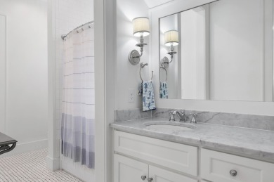Discover the perfect fusion of modern elegance and artistic on Regatta Bay Golf and Country Club in Florida - for sale on GolfHomes.com, golf home, golf lot