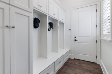 Discover the perfect fusion of modern elegance and artistic on Regatta Bay Golf and Country Club in Florida - for sale on GolfHomes.com, golf home, golf lot
