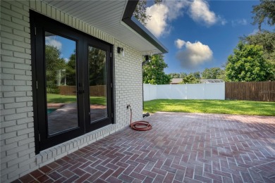 This stunningly remodeled 4/3 pool home in the highly on Lone Palm Golf Club in Florida - for sale on GolfHomes.com, golf home, golf lot