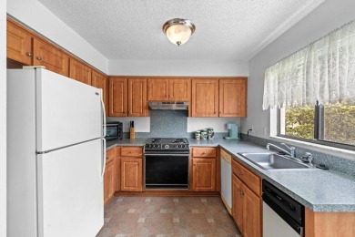 Welcome to your serene second-floor retreat in the heart of on Heather Golf and Country Club in Florida - for sale on GolfHomes.com, golf home, golf lot
