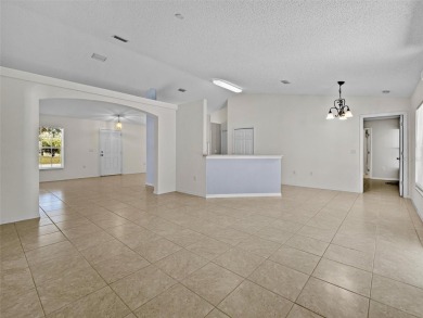 Better Than New! 3 Bed, 2 Bath Home with Screened Porch and on The Grand Club Cypress Course in Florida - for sale on GolfHomes.com, golf home, golf lot